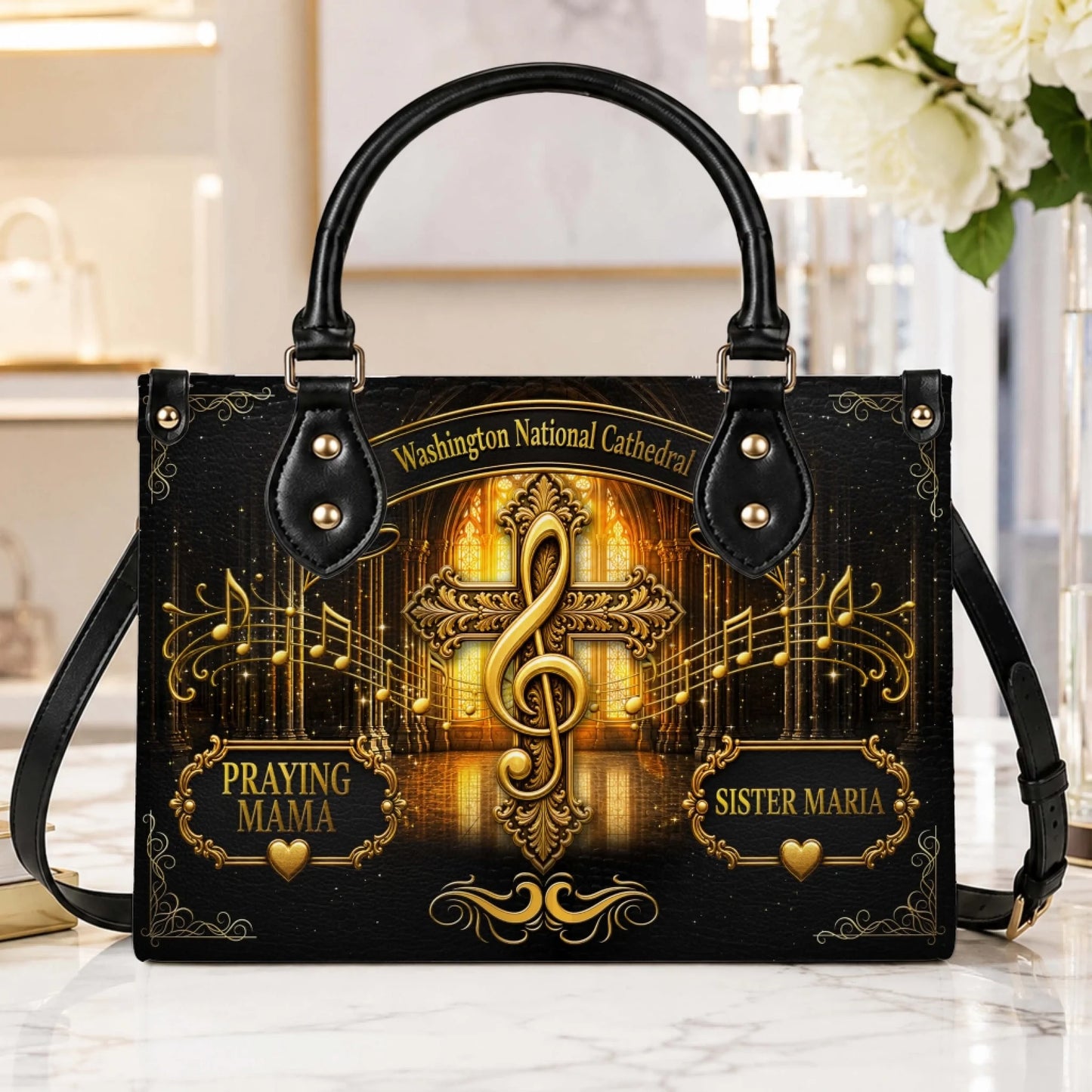 Customizable black handbag with a musical treble clef cross, cathedral background, and personalized name text.