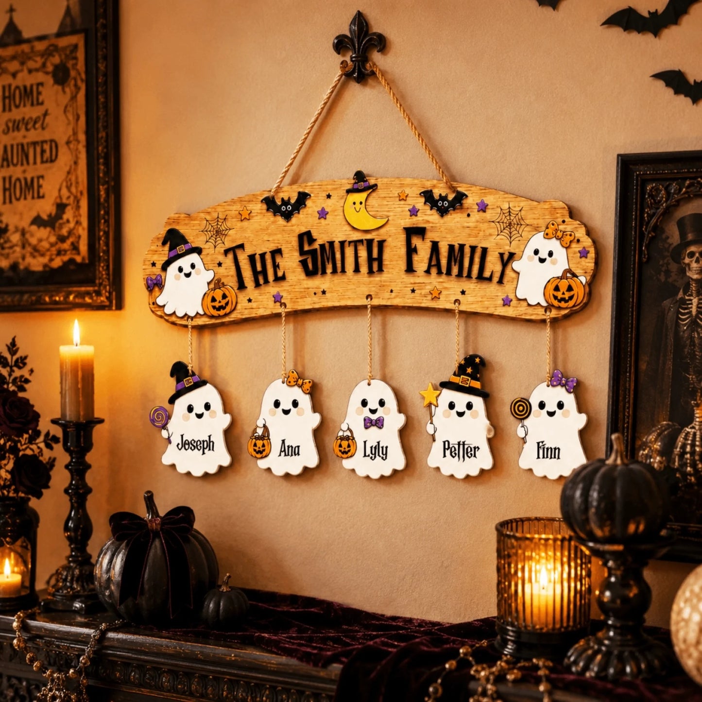 Custom wooden family halloween wall sign with five hanging ghost ornaments personalized with names for holiday decor.