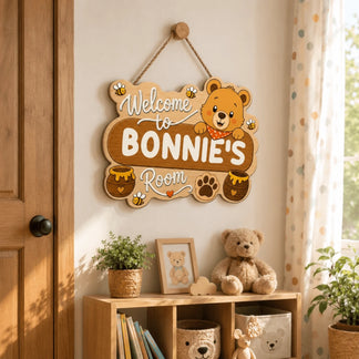 Cute bear themed personalized wooden wall hanging sign for a childs room featuring honey bee accents and custom text