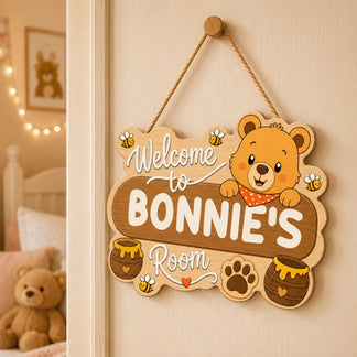 Custom wooden welcome sign for a baby nursery featuring a cute bear cartoon honey pots and the name Bonnies Room decor