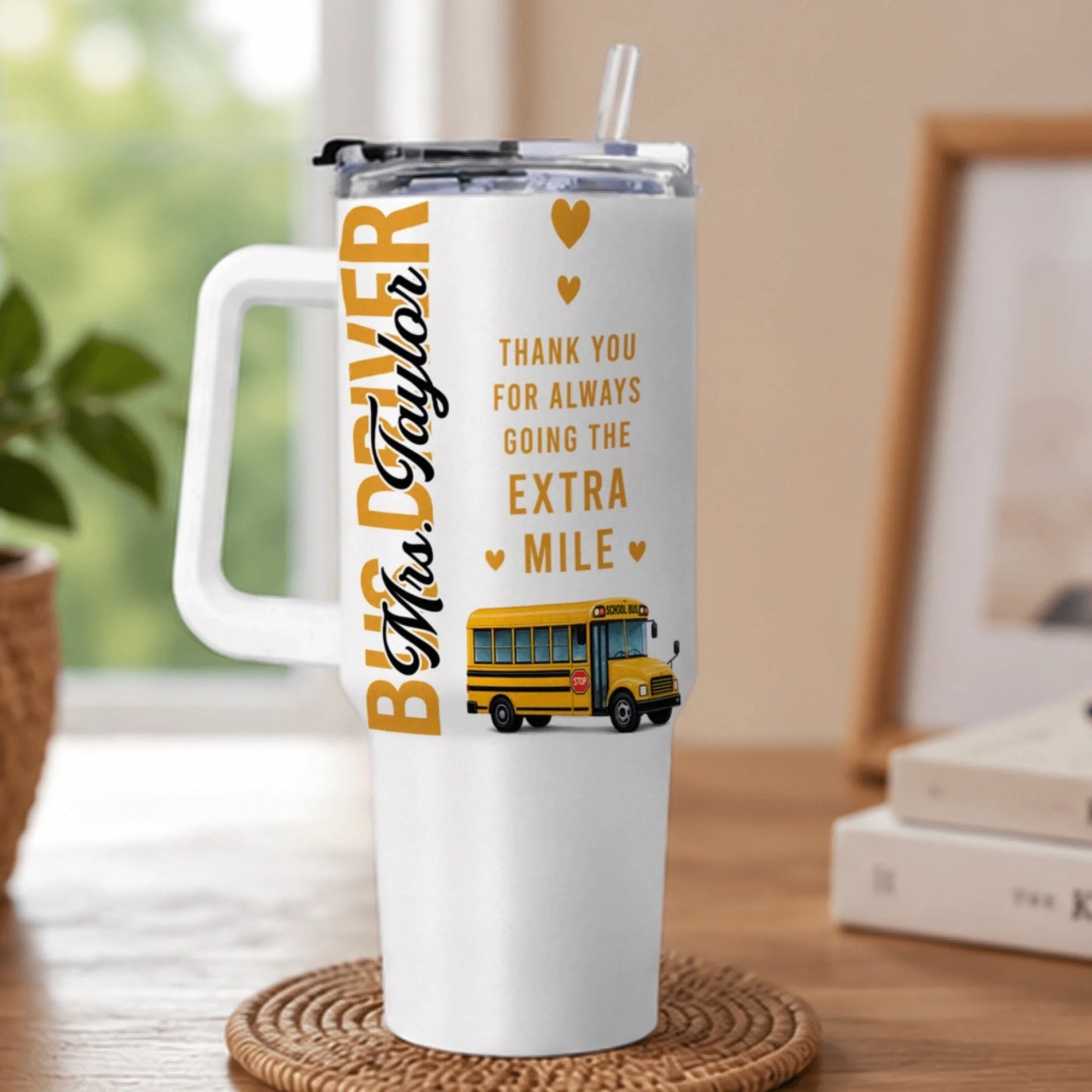 Side view of custom bus driver tumbler showing handle and straw lid