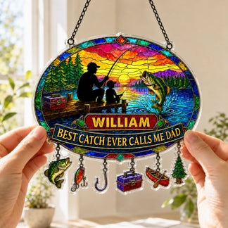 Colorful stained glass panel with fishing design and 'William Best Catch Ever Calls Me Dad' text, held by hands.