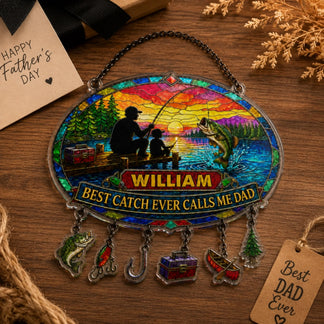 Decorative stained glass ornament with fishing theme on a wooden surface, featuring a 'Happy Father's Day' card and 'Best Dad Ever' tag.