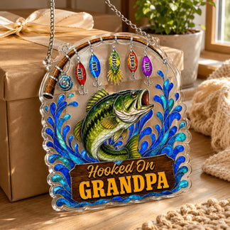 Decorative sign with a fish and 'Hooked on Grandpa' text, surrounded by gift-wrapped presents and plants.