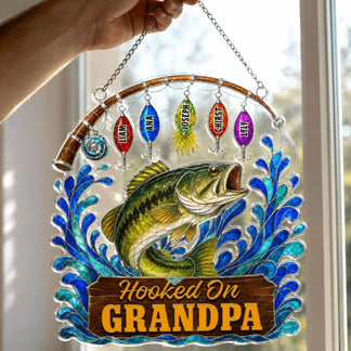 Decorative wall hanging with a fish and colorful fishing lures, featuring the text 'Hooked On Grandpa'.