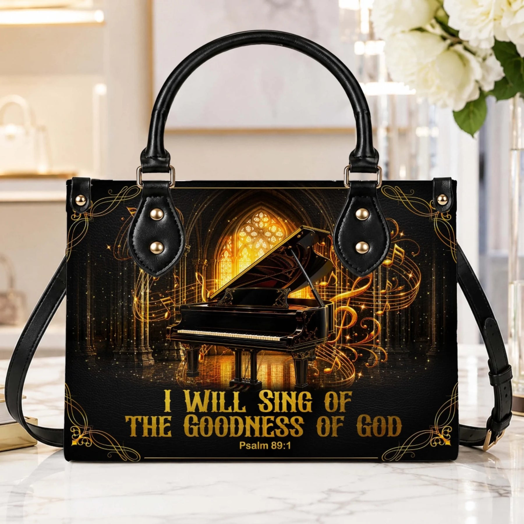 Elegant black piano themed shoulder bag with gold musical accents and Psalm 89 1 inspirational bible verse.