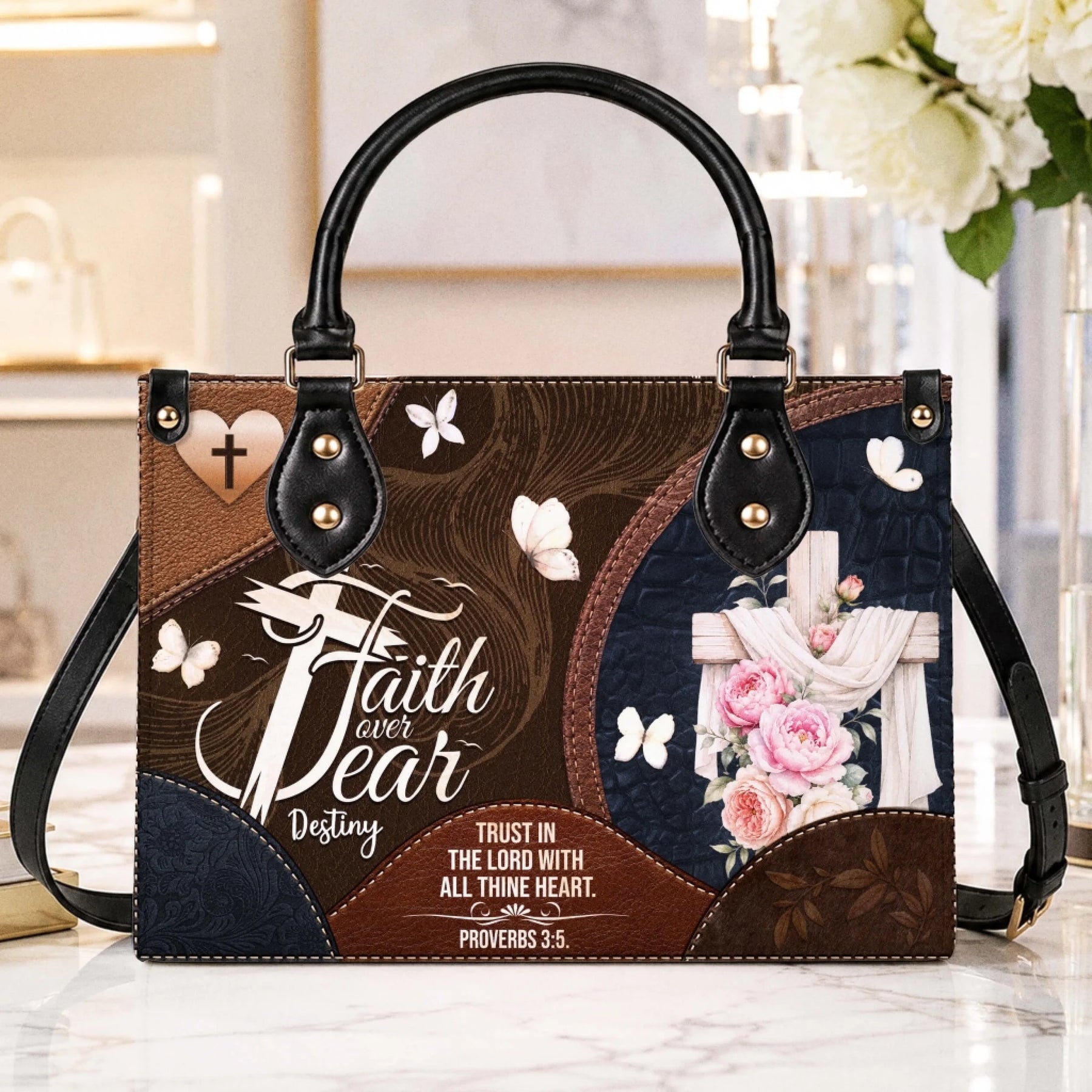 Stylish Christian handbag with a floral cross and Bible verse print, suitable as a spiritual gift for any occasion.