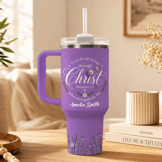 Purple stainless steel insulated tumbler with floral art and Philippians 4:13 verse text and personalized name.