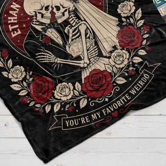 Cozy personalized throw blanket for couples featuring skeleton bride and groom in love with romantic red rose design.