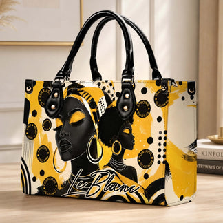Fashion shoulder bag featuring artistic portraits of black women and motivational words in a chic yellow and black theme