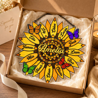 Sunflower-shaped decorative item with names and butterflies in a gift box