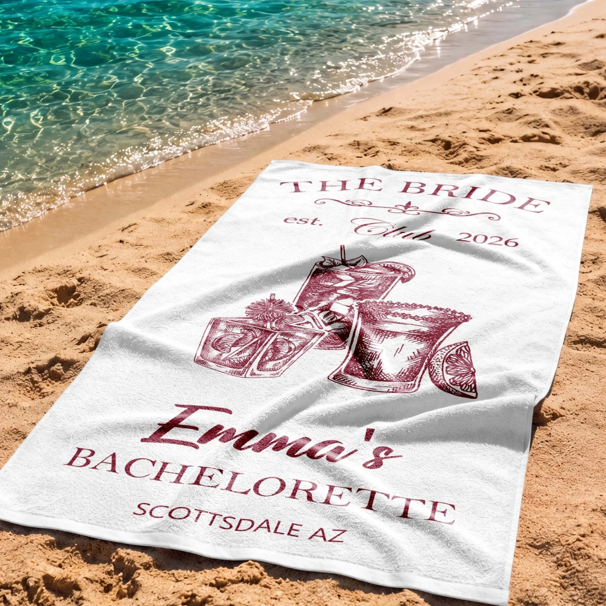 Personalized bachelorette beach towel for The Bride in Scottsdale AZ featuring festive cocktail illustrations.