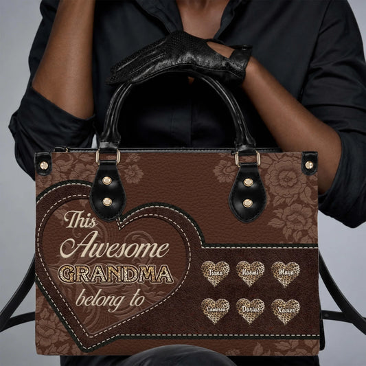 A personalized brown leather handbag featuring floral patterns and leopard print hearts with custom names for grandma.