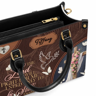 Close up of personalized floral cross leather handbag with custom Tiffany name label and gold hardware details
