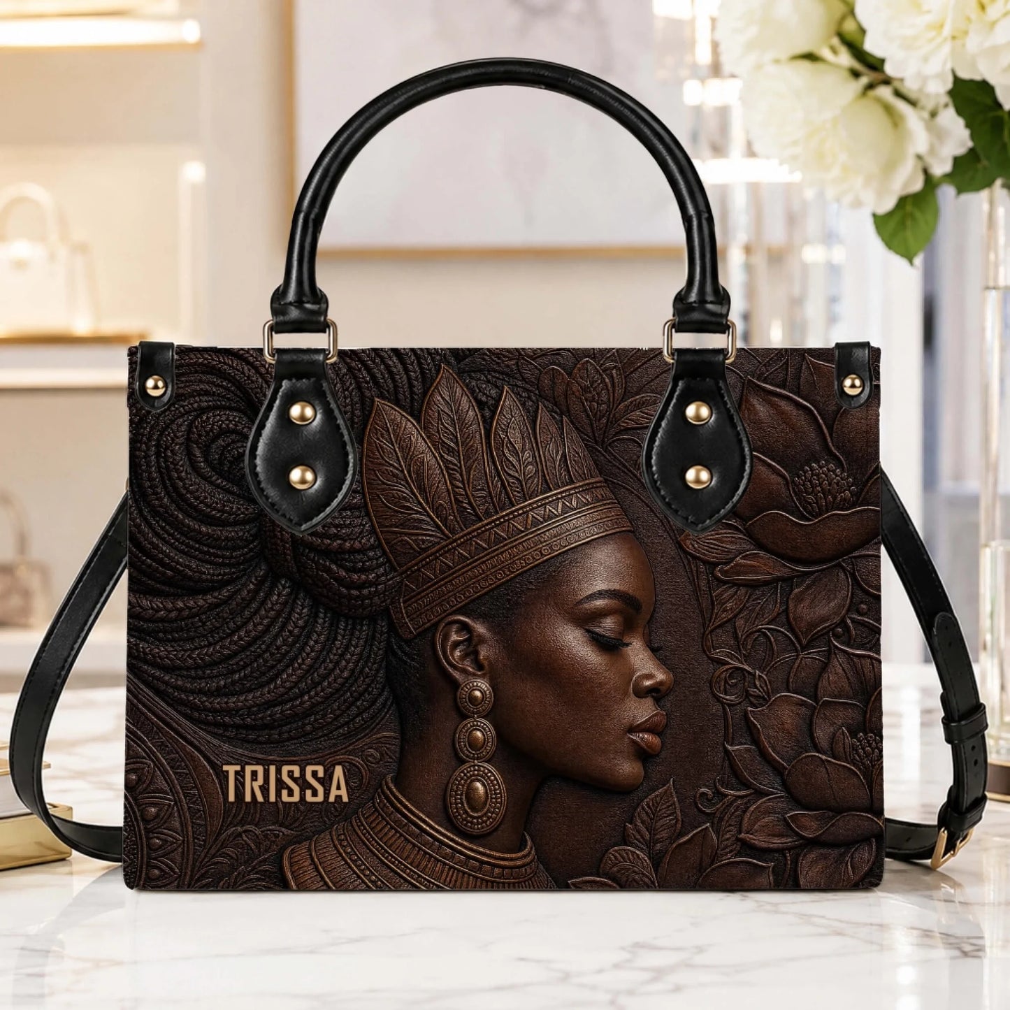 Elegant PU leather shoulder bag with an intricate embossed design of an African queen for a sophisticated look.