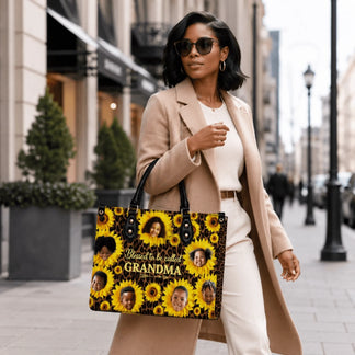 Stylish woman wearing a camel coat holding a personalized sunflower grandma tote bag with photos of grandchildren.