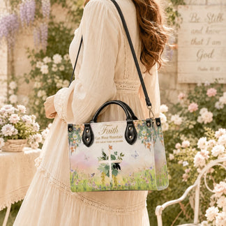 A woman wearing a light dress carries a custom religious tote bag featuring a floral cross and faith quote design.