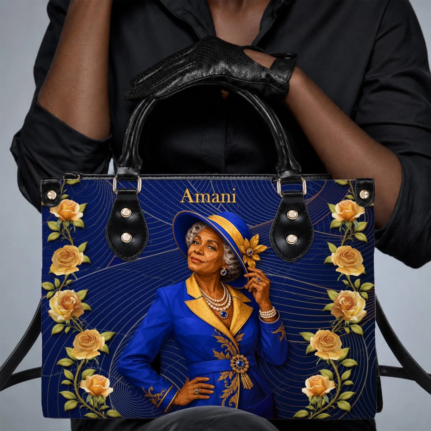 Elegant lady holding a custom blue handbag with gold rose accents and personalized Amani name design.
