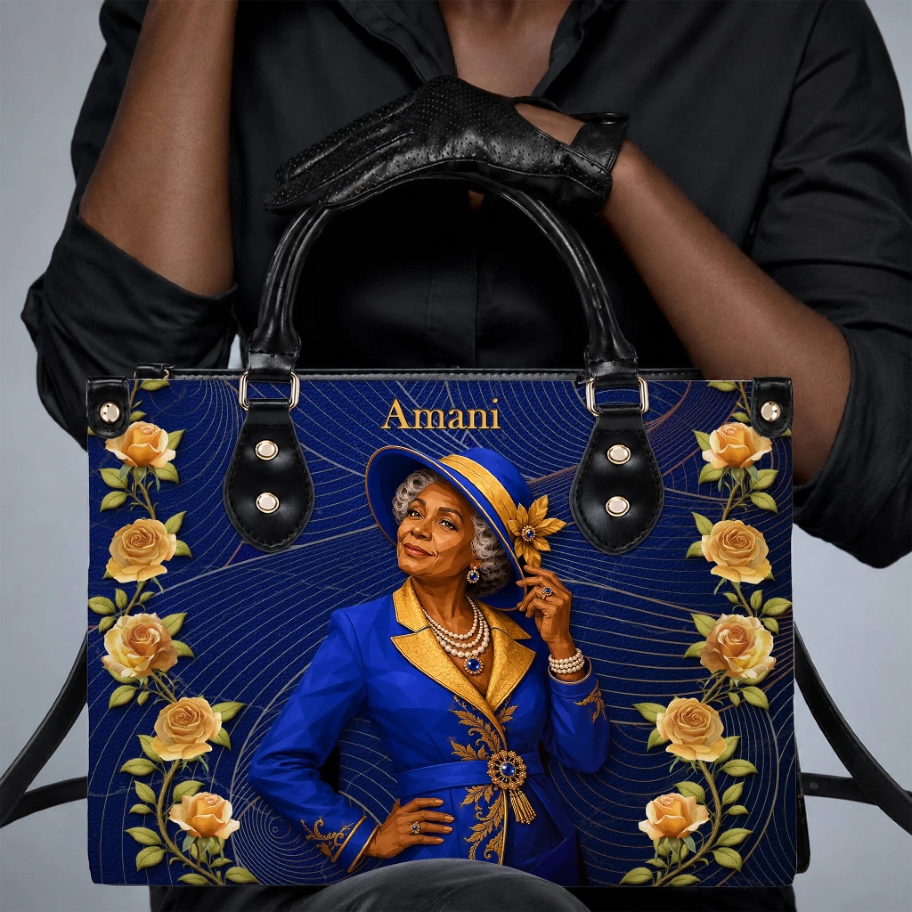 Elegant lady holding a custom blue handbag with gold rose accents and personalized Amani name design.
