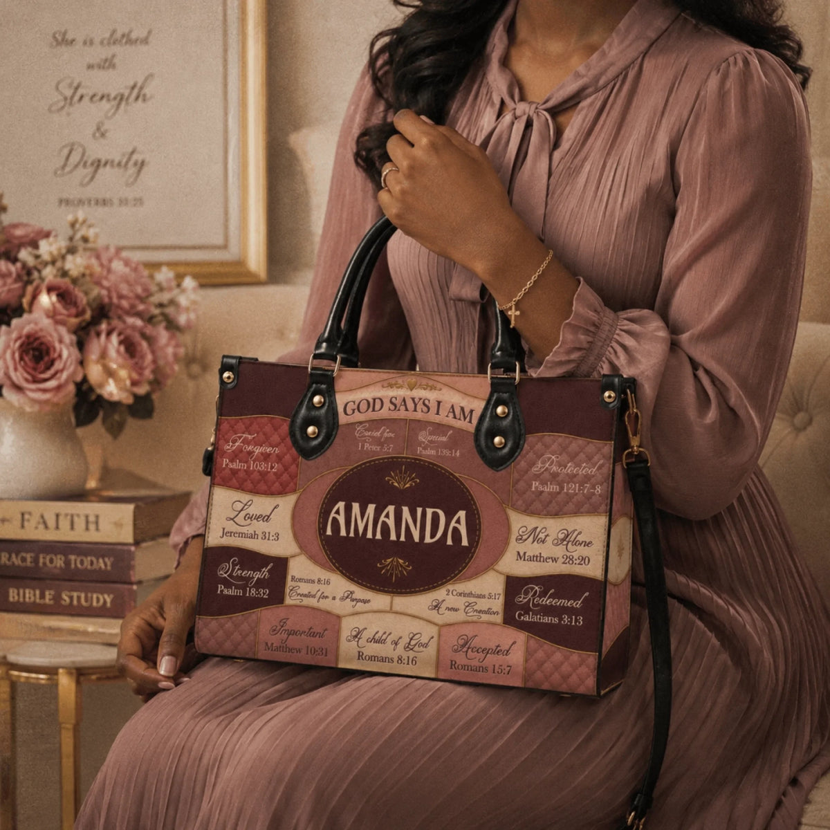 A woman holding a personalized handbag with scripture and the name Amanda, elegant accessory for a woman of faith.