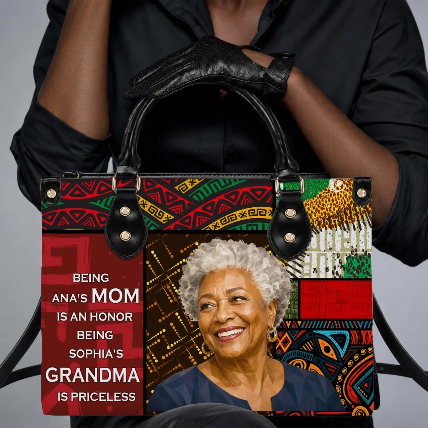 A woman holding a custom personalized tote bag designed for grandmothers with colorful African-inspired patterns and a sentimental message about being a mom and grandma.