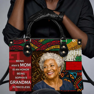 A woman holding a custom personalized tote bag designed for grandmothers with colorful African-inspired patterns and a sentimental message about being a mom and grandma.
