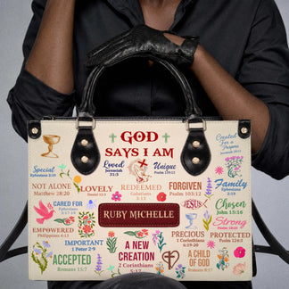 Person holding a custom-named religious handbag decorated with spiritual quotes and colorful floral illustrations.