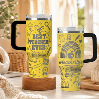 Custom yellow insulated tumbler featuring a best teacher ever design and cute school bus graphic for educators.