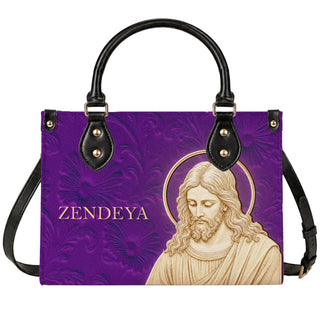 A purple handbag featuring a religious Jesus portrait and custom Zendeya text, perfect as a unique faith gift.